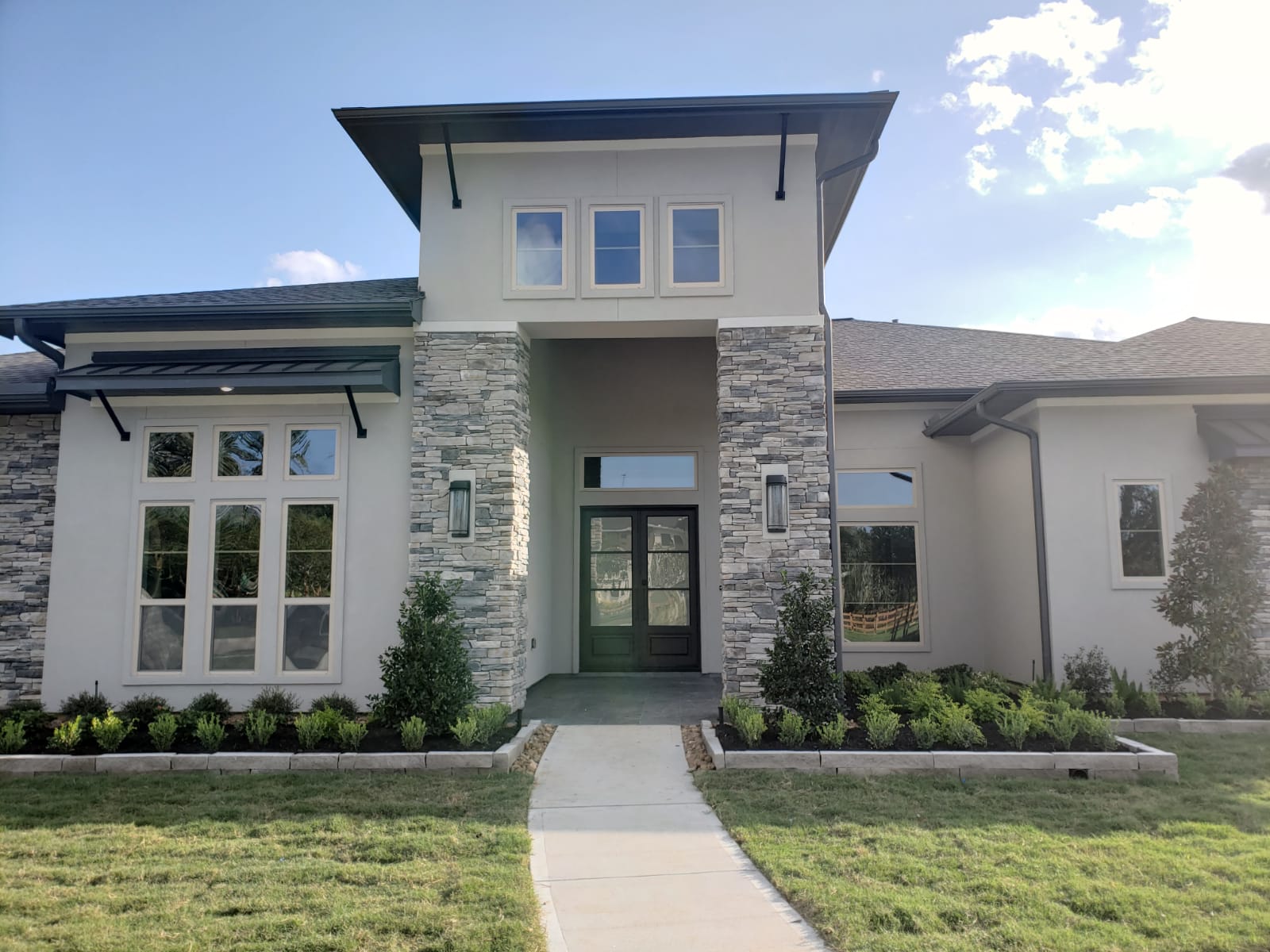 Wrought iron door with glass panels