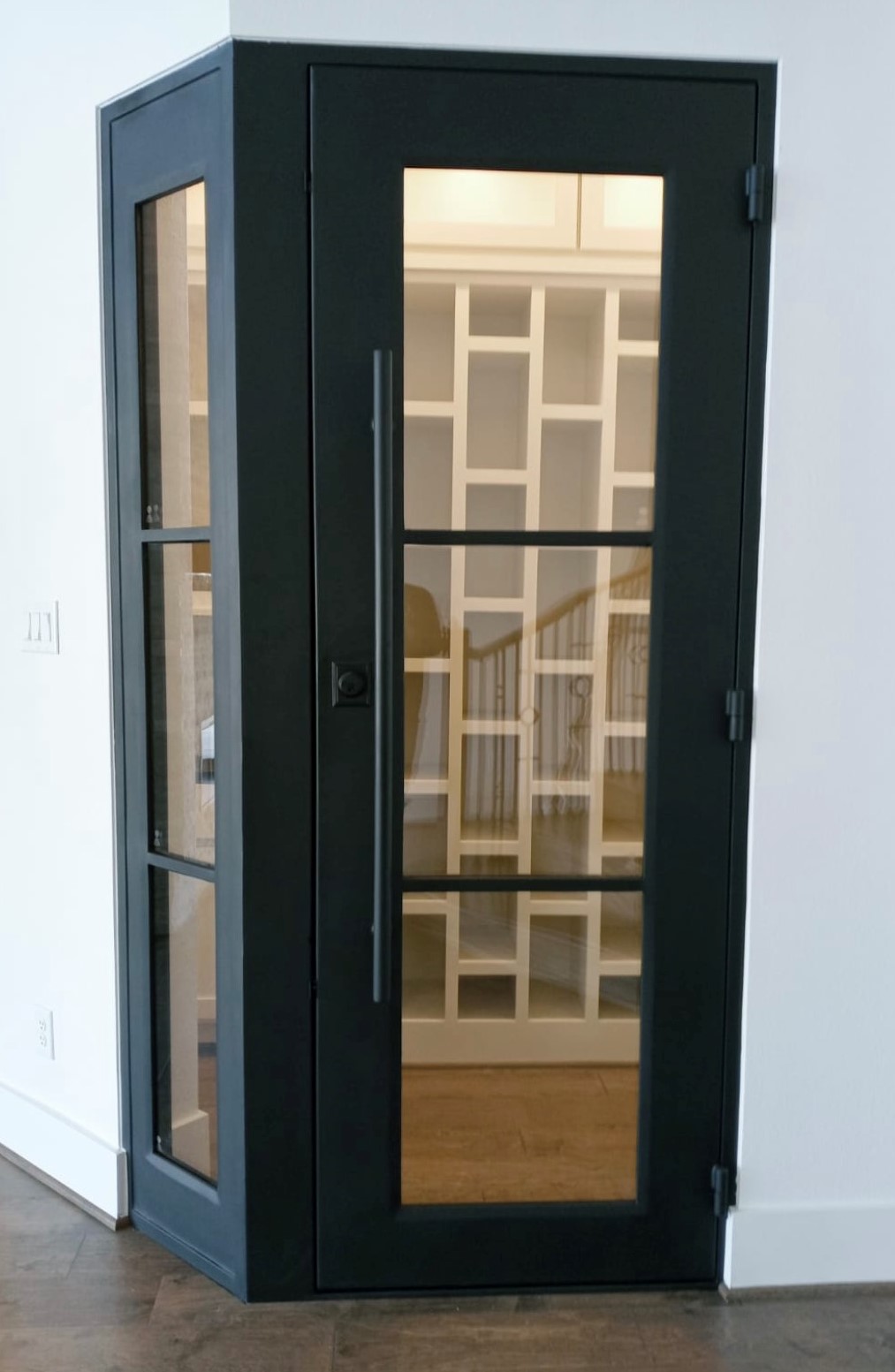 Custom iron wine room door