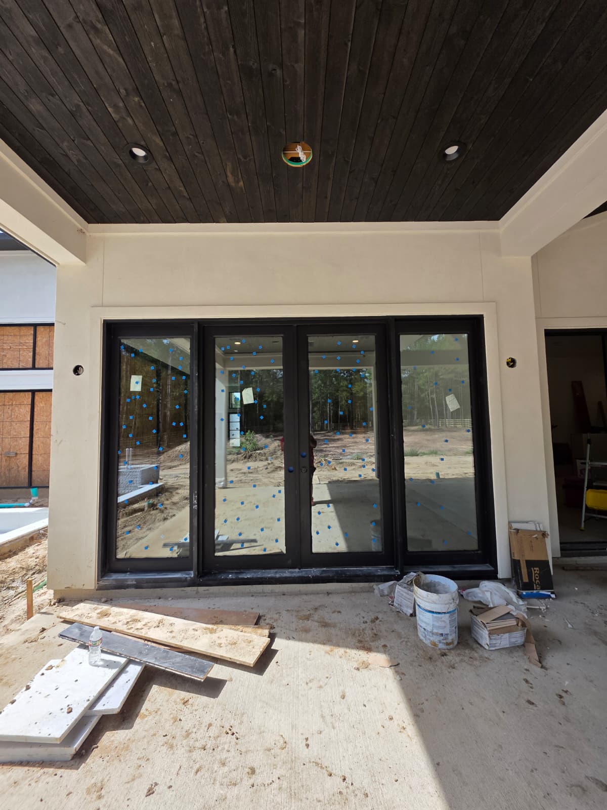 Custom four-panel black iron patio entry